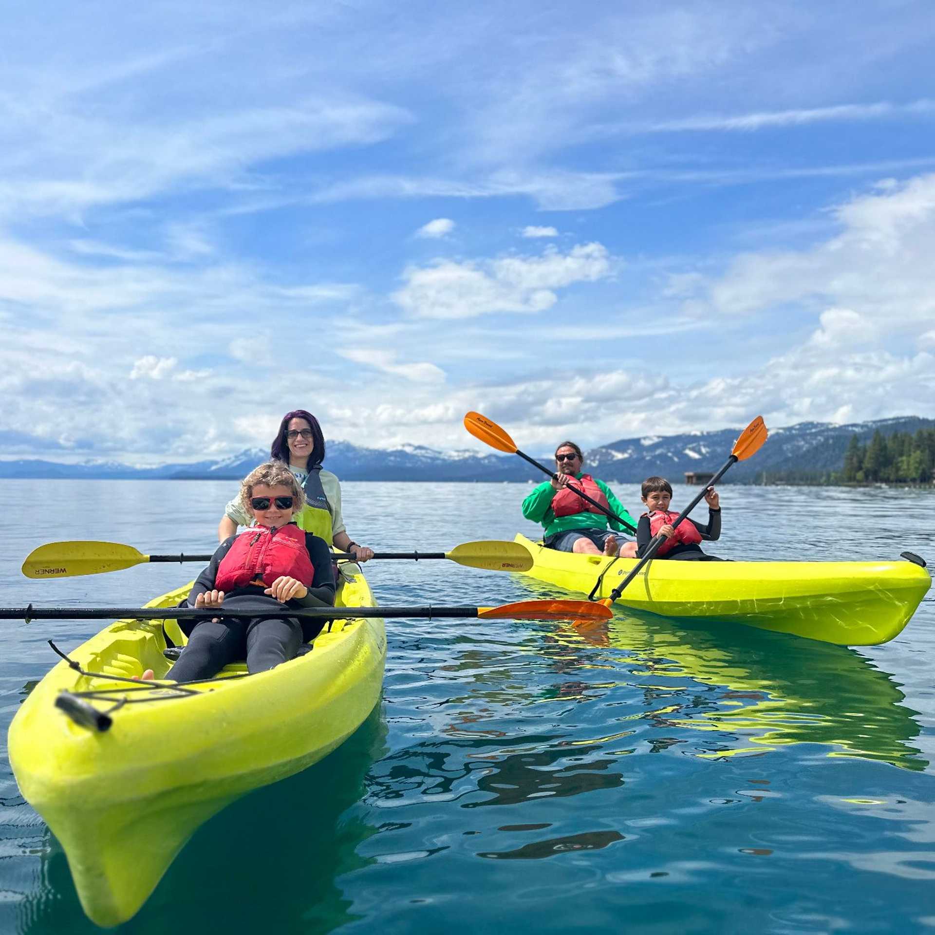family kayaking on Lake Tahoe